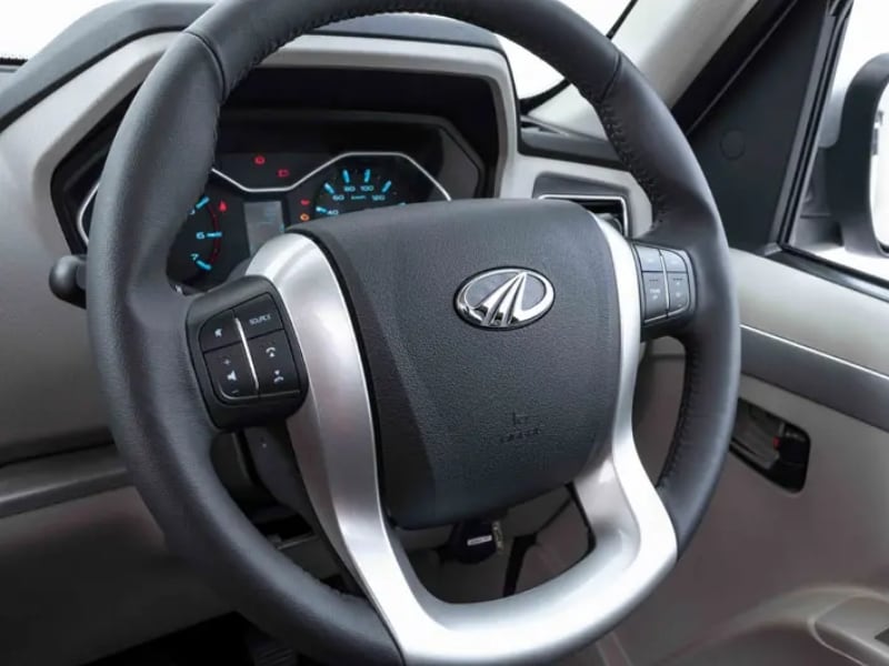 Steering-mounted controls for phone, audio, and cruise function